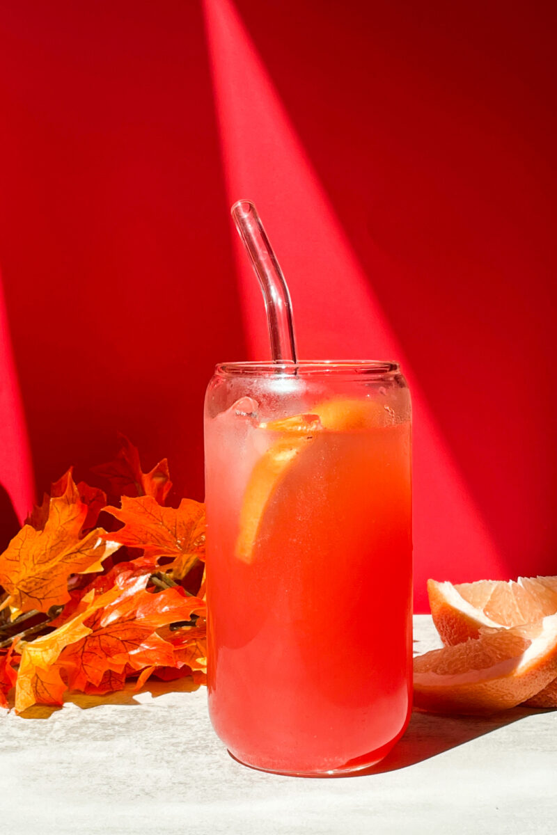 Orangina - Glass Straw Sipping in Autumn Leaves