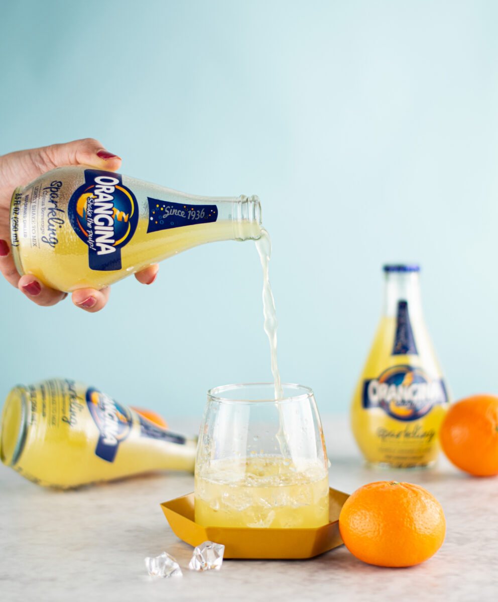 Orangina - Pouring Bottle into a Glass