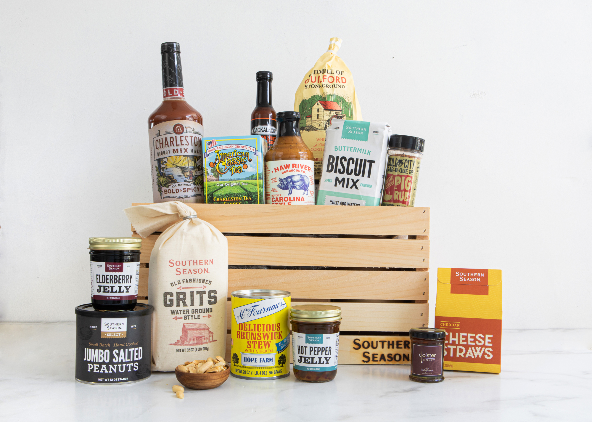 Southern Season's Carolina Pantry Gift Crate Set including over a dozen best sellers like Elderberry Jelly, Grits, Cheese Straws, Biscuit Mix, Jumbo Salted Peanuts and more