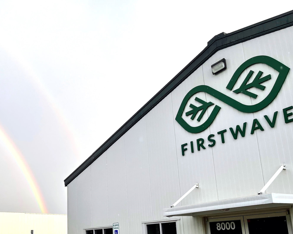 SinnovaTek FirstWave's logo on the exterior of their headquarters in Raleigh, NC